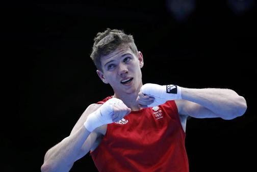 GOING FOR GOLD: Great Britain's Luke Campbell celebrates beating Satoshi Shimizu of Japan 20-11 to book a bantamweight gold medal showdown with Ireland's John Joe Nevin 