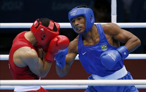 BRONZE FOR OGOGO: Great Britain's Anthony Ogogo fights Brazil's Esquiva Falcao Florentino but goes down in their middleweight contest 16-9 to leave him with a bronze medal 