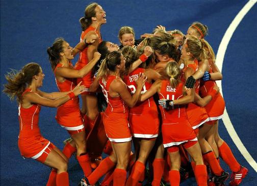 GOLDEN ORANGE: The Netherlands celebrate winning gold in the women's hockey after defeating Argentina