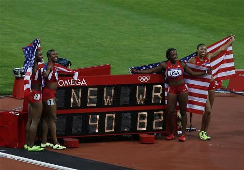 WORLDS BEST: The USA women's 4x100m relay team celebrate breaking the East German's world record held since 1985